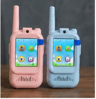 Kids walkie talkie pink and blue on dock close-up