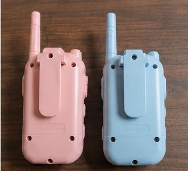 Kids walkie talkie blue unit on charging stand