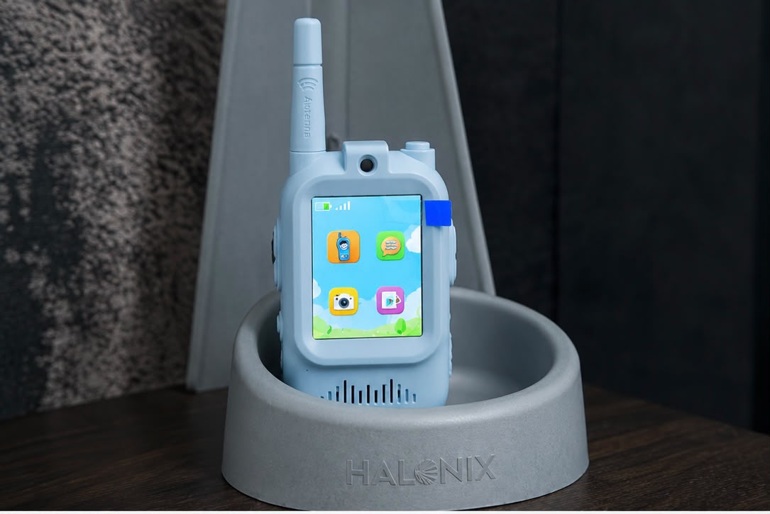 Kids walkie talkie pink unit on charging stand